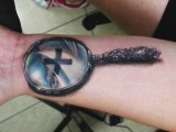 3d tattoo лупа на руке