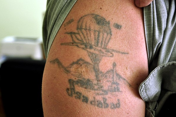 Татуировка на руке в память об Асадабаде