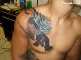 Цветная татуировка на груди «Пантера с крыльями»